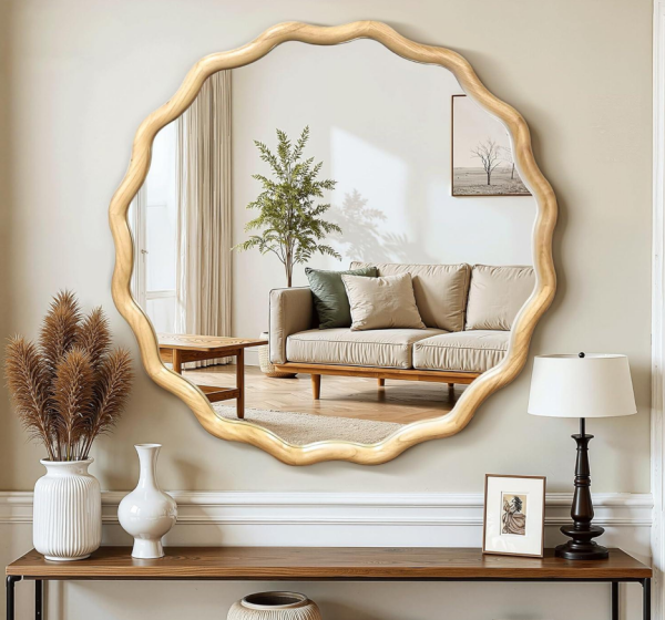 Round wooden-framed wall mirror with a wavy profile and scalloped edges, 24 inches in diameter—suitable for hallways or bedrooms.